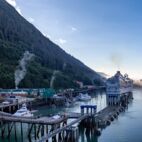 Panoramic shot of port of Juneau and mountains covered ... Alaska. Cruise ship and boats - Von Sergey